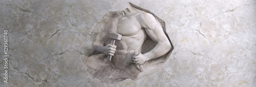 epic background of athletic man cuts his body of marble stone