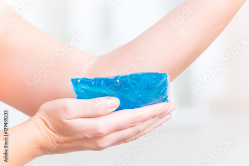 Cold gel compress on the elbow