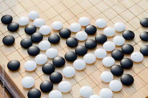 Chinese board game go with black and white stones