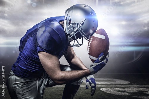 Composite image of upset american football player with ball