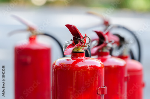 Red tank of fire extinguisher