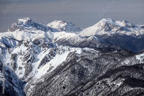 Beautiful snowy mountain peaks scenic winter landscape