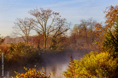 morning fog over river in autumn