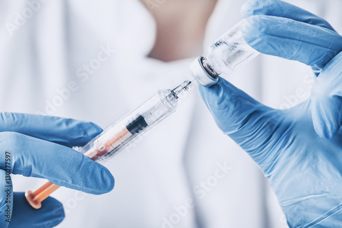 Doctor with injection vaccine vaccination medicine