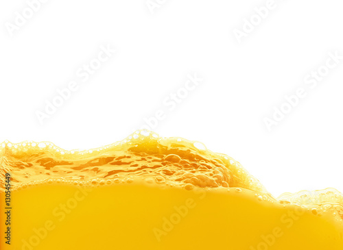 Orange juice splash isolated on white background