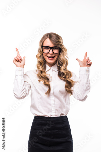 Young business girl with eyeglasses pointed up on white backgroung