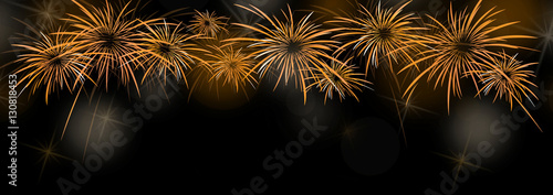 New year banner background with colorful gold and yellow fireworks 