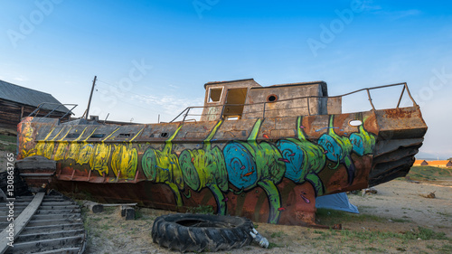 the ship is painted in graffiti style