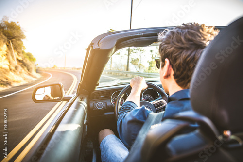 Couple on convertible car