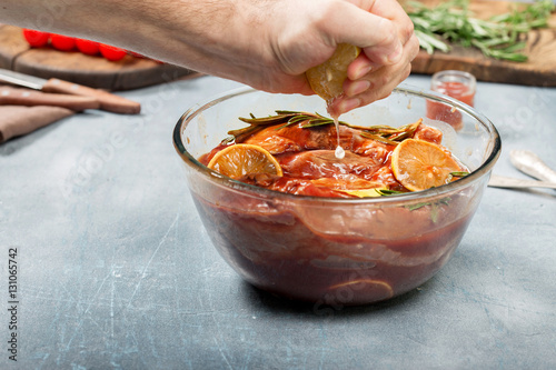 Man is making marinade beef for stewing