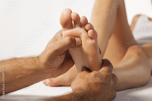 reflexology and acupressure on women's feet