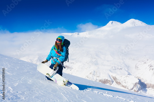 Woman, snowboard winter, lift, goggles, elbrus