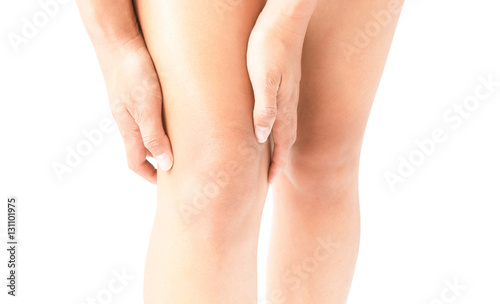 Closeup woman hand hold knee with pain symptom, health care and