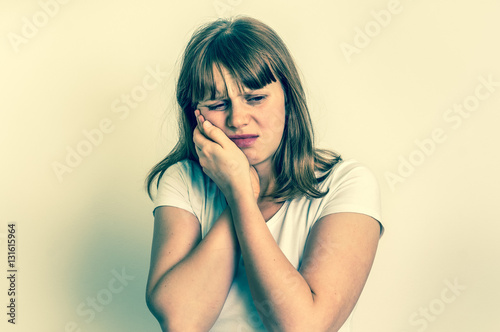 Woman suffering from toothache - retro style