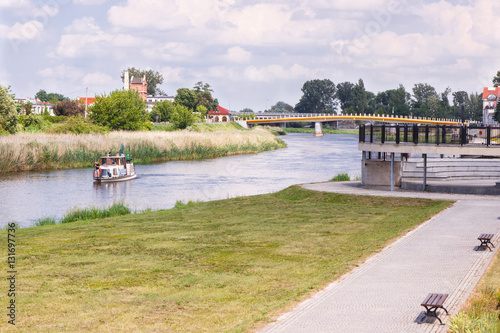 Konin, Poland - June 18, 2016: Embankment of polish Warta river in town Konin