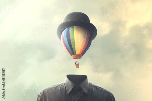 man with big balloon fly on his head, changement concept