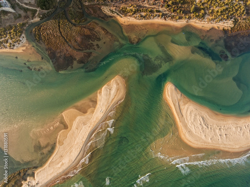 Aerial. Sandy Bay and waves filmed from the sky.