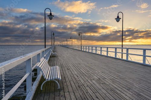 Wooden pier in Gdynia Orlowo in the morning. Sunrise time. Poland. Europe.