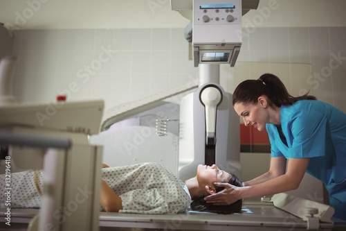 Female patient undergoing an x-ray test