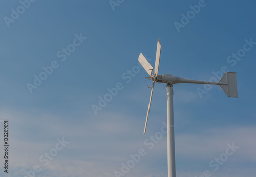 Wind turbines and blue sky , Eco power.