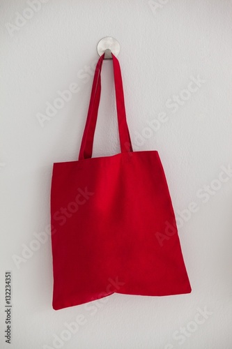 Red bag hanging on wall