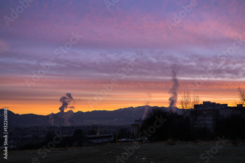 Sunrise, mountains and city. Slovakia
