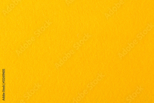 Close up of bright yellow felt fabric.