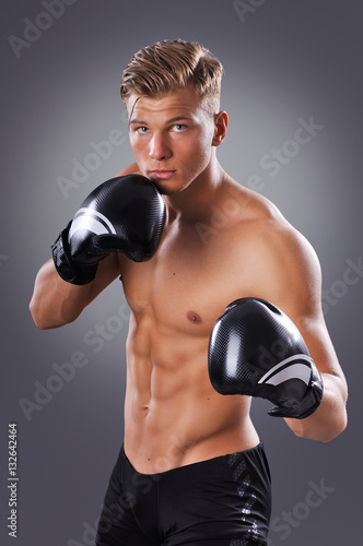 Portrait of Handsome Muscular Fighter Practicing. Concept of Healthy Lifestyle.