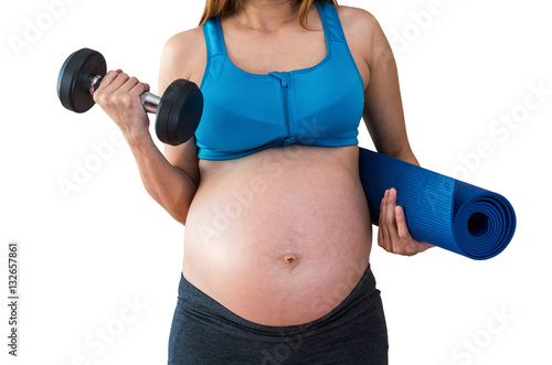 Closeup asian Pregnant female do exercise in sports room, liftin
