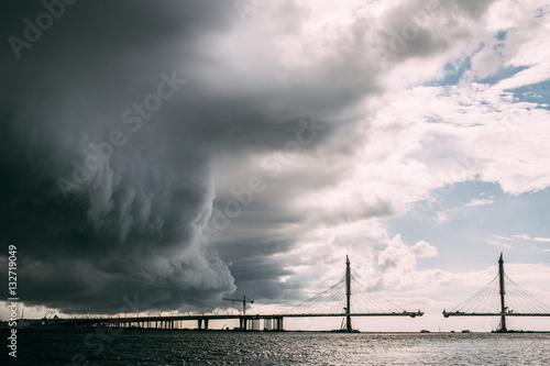 The storm is approaching the city from the bridge