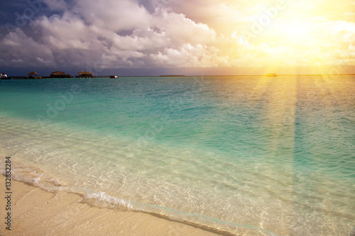 Maldives. A sandy beach and an ocean coast