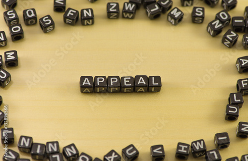 The word appeal on wood background