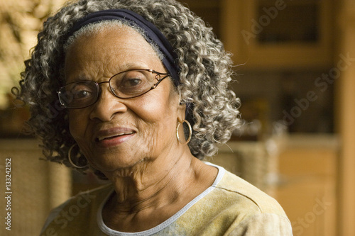 Portrait of an elderly African American woman at home.