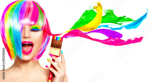 Dyed hair humor concept. Beauty model woman painting her hair in colourful bright colors