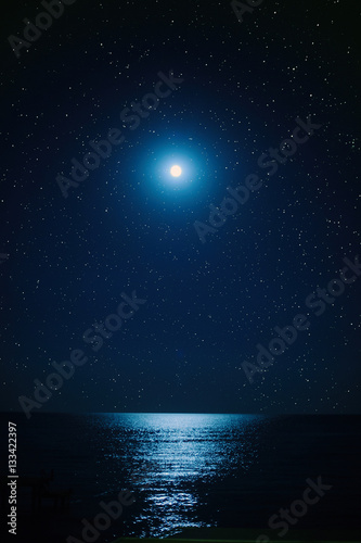 the full moon in the starry sky ,the moonlight on the sea