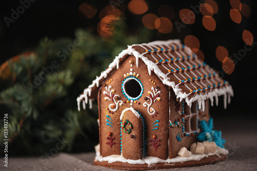 Christmas gingerbread house decorated with glaze