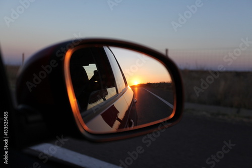 Sunset in a rear view mirror