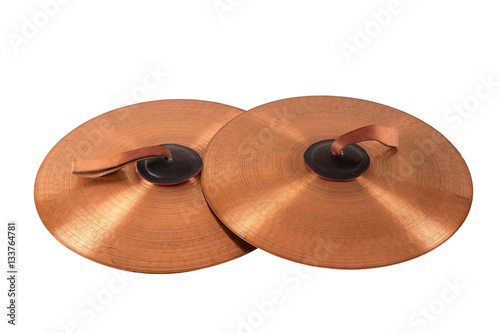 Close up of an prcussion cymbals with leather handle isolated on background.