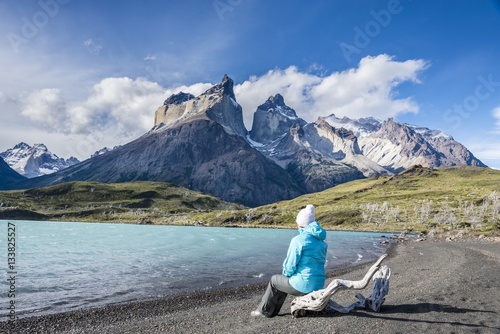 Girl on the observation deck on the lake. Los Cuernos, Torres del Paine National Park, Patagonia, Chile