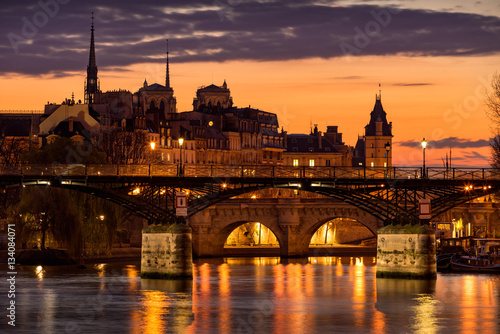 Sunrise on Ile de la Cite with view on the Pont des Arts, Pont Neuf and the Seine River. 1st Arrondissement, Paris, France