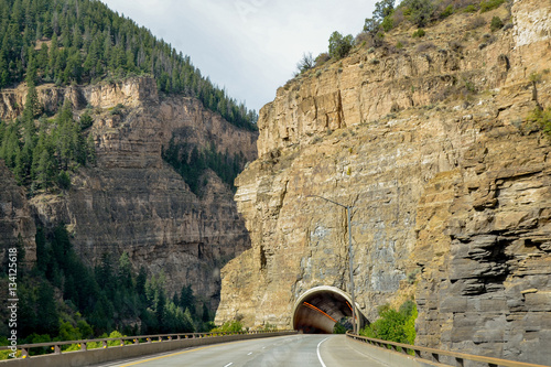 US Interstate 70 (I-70) westbound entering tunnel in Glenwood Canyon Garfield county, Glenwood Springs, Colorado, USA