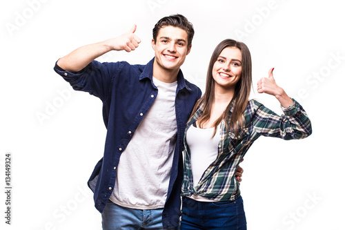 Beautiful couple with okay sign on white background