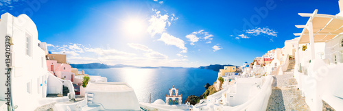 Panorama of Oia village with colorful houses , view of Oia town, Santorini island, Greece