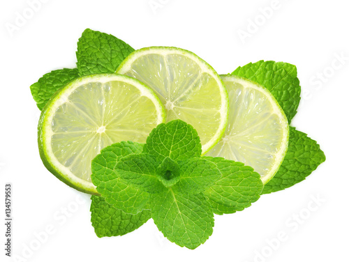 fresh slices lime with leaf mint isolated on white