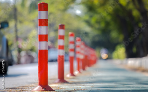 Orange traffic reflective bollards