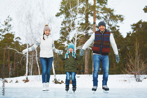 Family on ice-rink