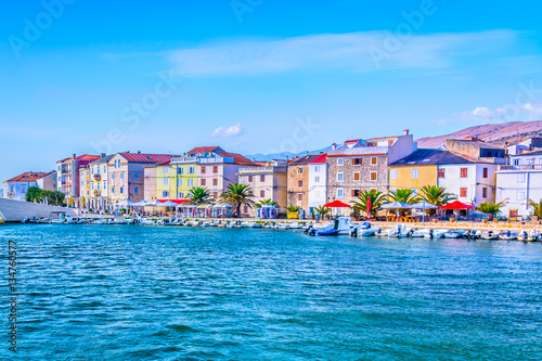 Pag town coastal view. / Scenic view at colorful promenade in town Pag, popular touristic destination on Adriatic Sea.