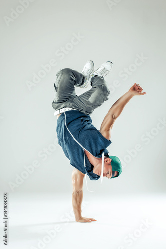 Man break dancer on white studio background