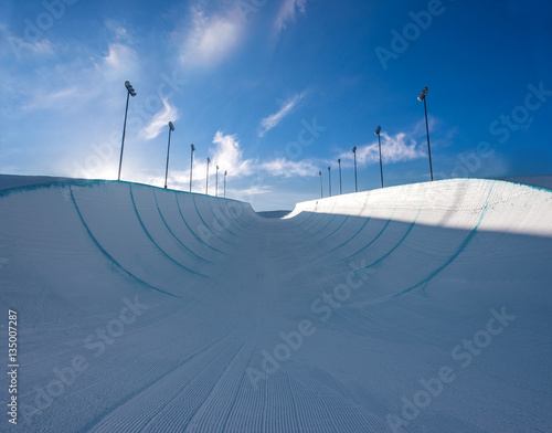 Empty winter snow halfpipe