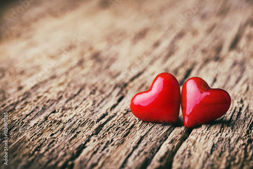 Love - Valentines Day Background - Two hearts on rustic wood 